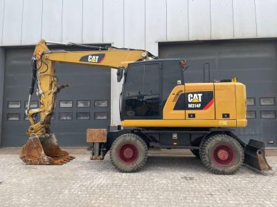 Caterpillar M314F with Outriggers sold by Big Machinery