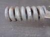 Track adjuster spring for Liebherr 924 B Photo 1 thumbnail