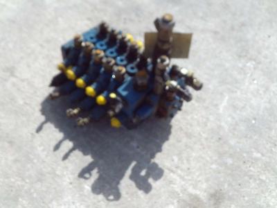 Hydraulic distributor for Mecalac 12MXT sold by OLM 90 Srl