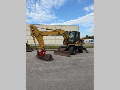 Caterpillar m312 Photo 1