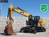 Caterpillar M322 F OUTRIGGERS + BLADE Photo 1 thumbnail