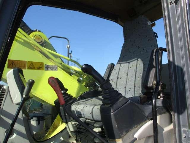 New Holland E245C Photo 18