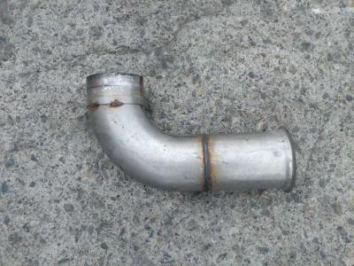 Exhaust elbow for Volvo L350F sold by CERVETTI TRACTOR Srl