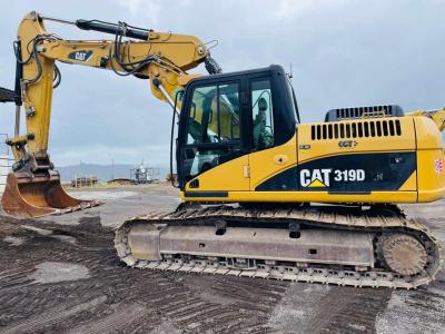 Caterpillar 319DLN sold by Omeco Spa