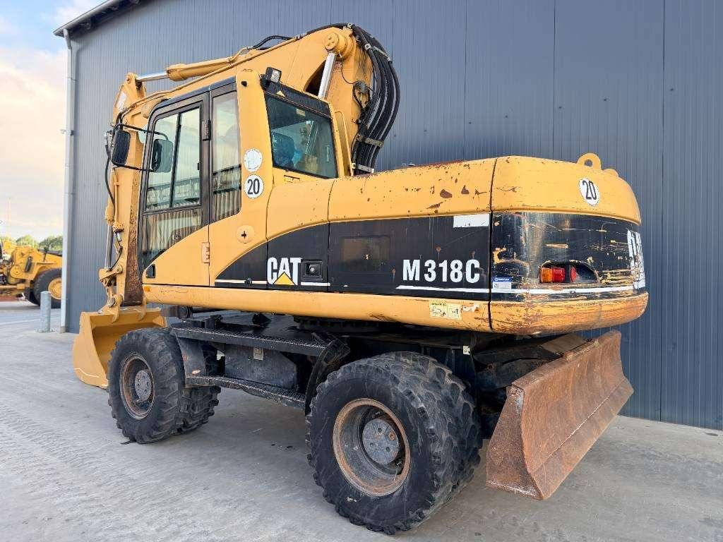 Caterpillar M318C Photo 1