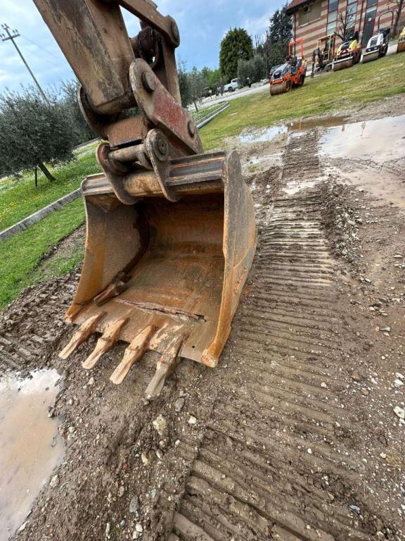 New Holland 305 Photo 10