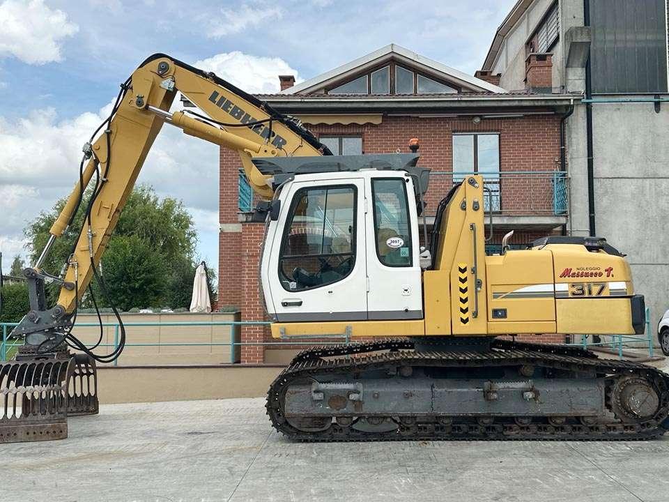 Liebherr R317 Litronic Photo 2