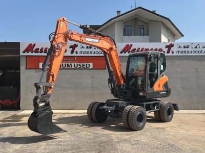 Doosan DX57W-5 sold by Massucco T. Srl