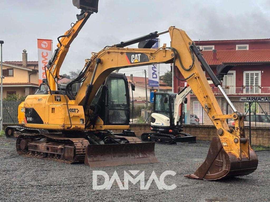 Caterpillar 311CU Photo 1