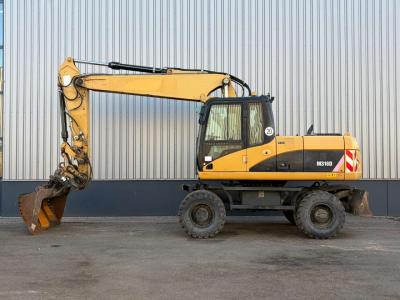 Caterpillar M316D Photo 1