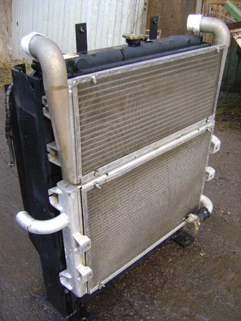 Oil radiator for Caterpillar 315C Photo 2