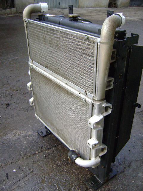 Oil radiator for Caterpillar 315C Photo 3