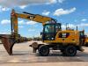 Caterpillar M316F Mobile excavator Photo 1 thumbnail