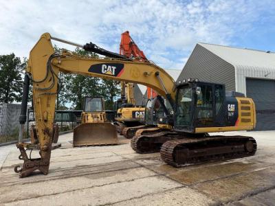 Caterpillar 323 EL sold by JN Machines BV