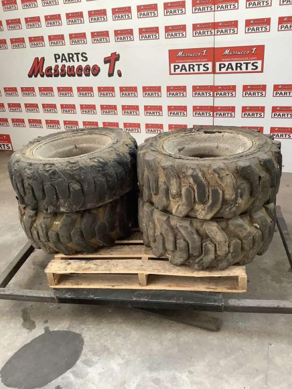 Tire with rim for Haulotte H15 SDX Photo 1