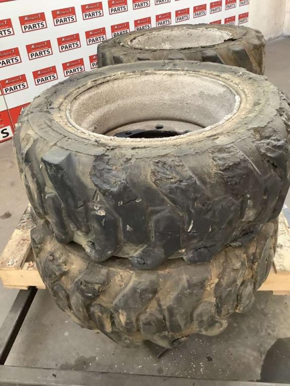 Tire with rim for Haulotte H15 SDX Photo 2