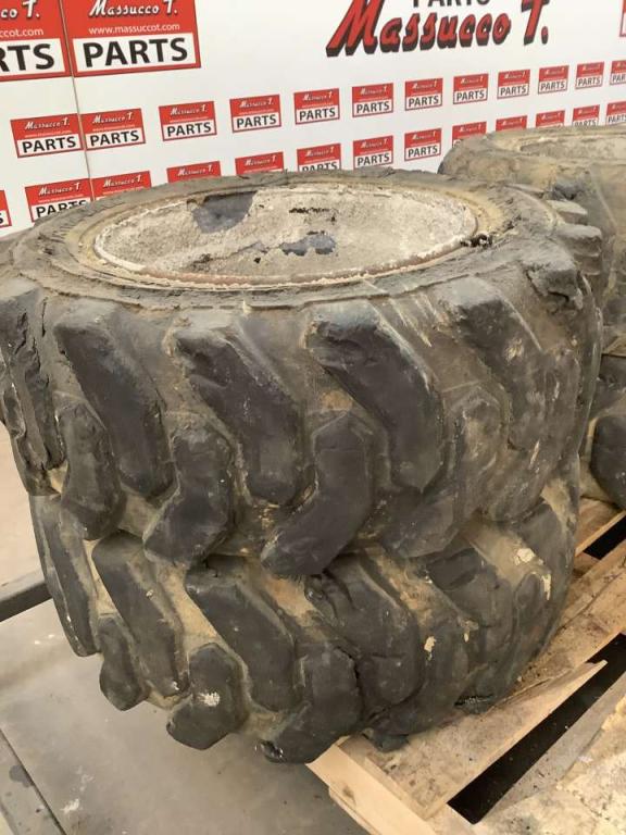 Tire with rim for Haulotte H15 SDX Photo 4