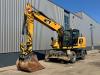 Caterpillar M316F Mobile excavator Photo 2 thumbnail
