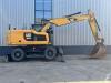 Caterpillar M316F Mobile excavator Photo 4 thumbnail