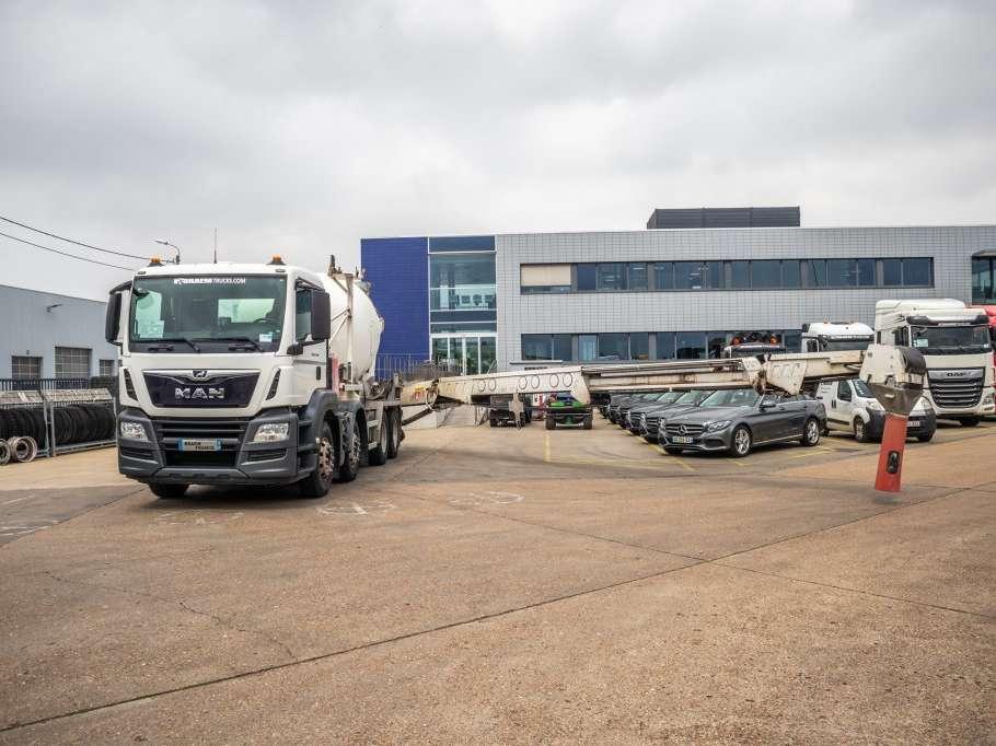 Man TGS 32.360+PUTZMEISTER8M³+BAND/BELT/TAPIS Photo 1