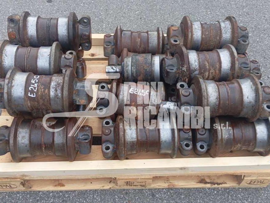 Upper and lower rollers for New Holland E 245 C Photo 1