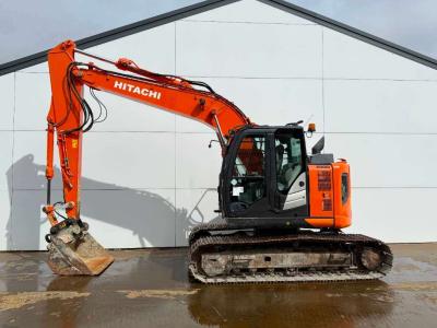 Hitachi ZX135US-6 - Quick Coupler / Hammer Lines sold by Boss Machinery