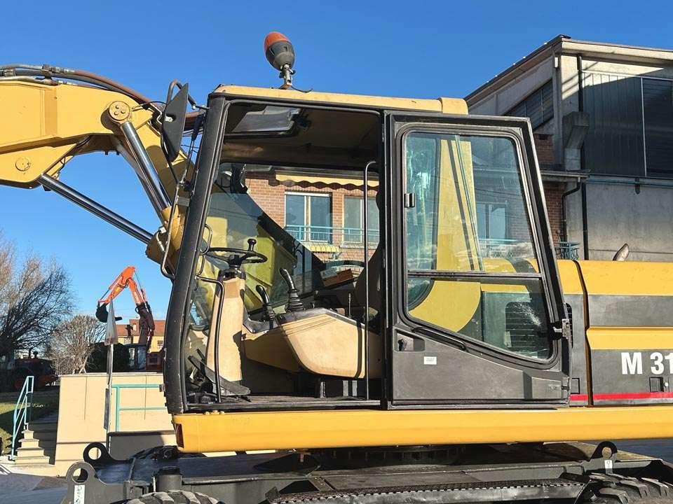 Caterpillar M315 Photo 13