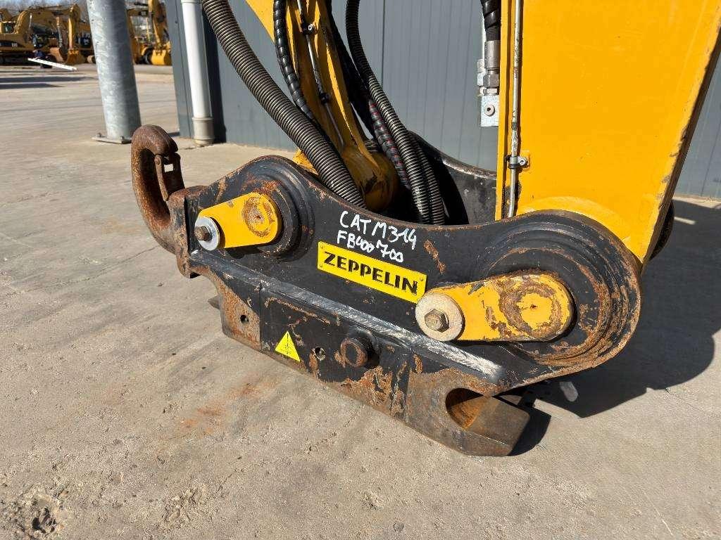 Caterpillar M315F - With OilQuick Photo 16