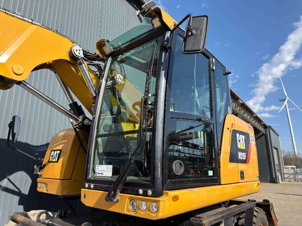 Caterpillar M315F - With OilQuick Photo 29