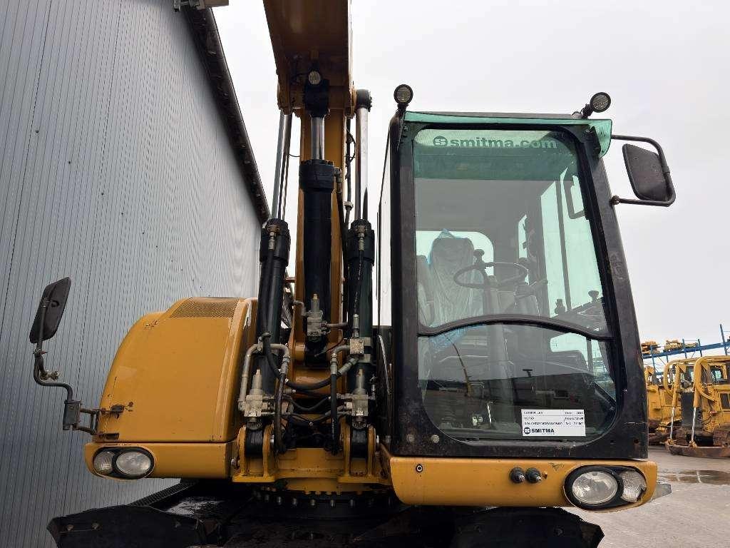 Caterpillar M316D Photo 6