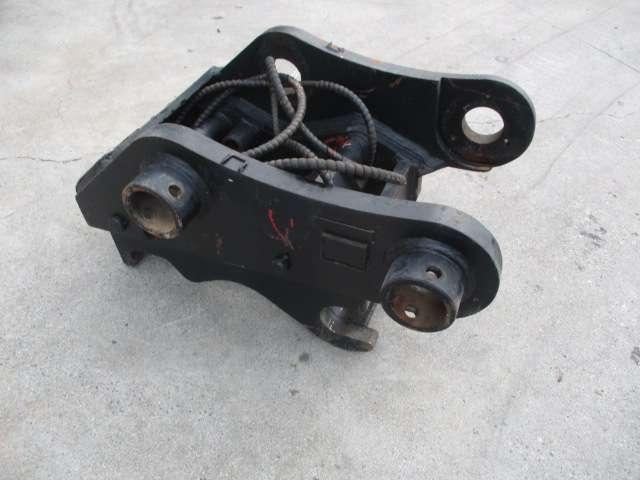 New Holland E285/305 Photo 1