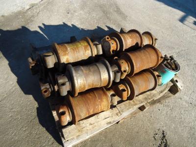 Upper and lower rollers for Fiat Hitachi FH300 sold by OLM 90 Srl