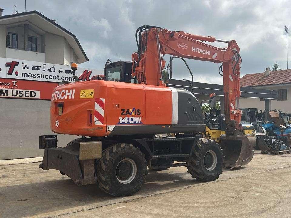 Hitachi ZX140WT-3 Photo 25
