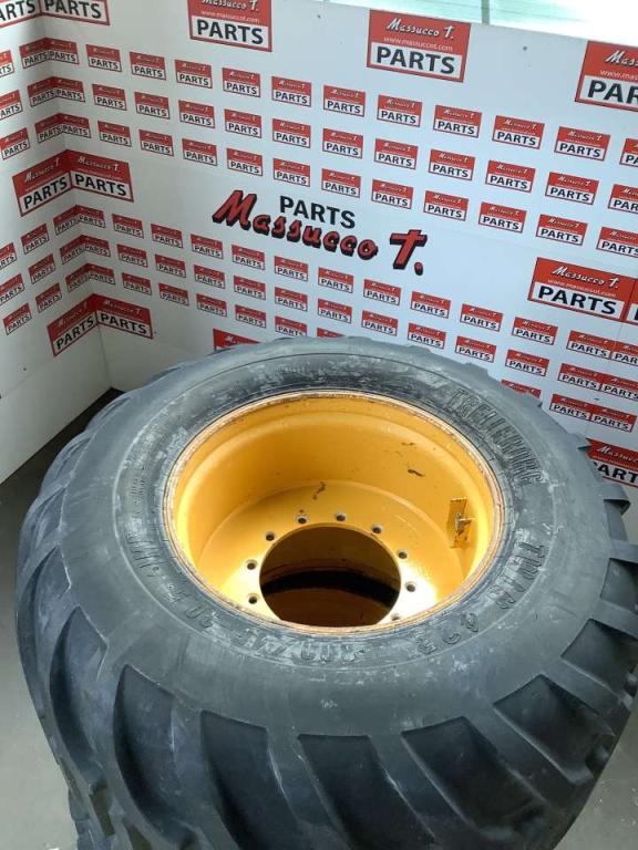 Tire with rim for Bell B20E Photo 1