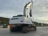 New Holland E 305 C Photo 1 thumbnail