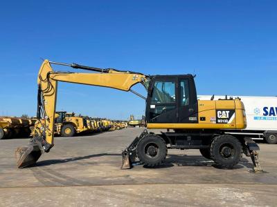 Caterpillar M313D VA - Outriggers + Blade sold by Big Machinery
