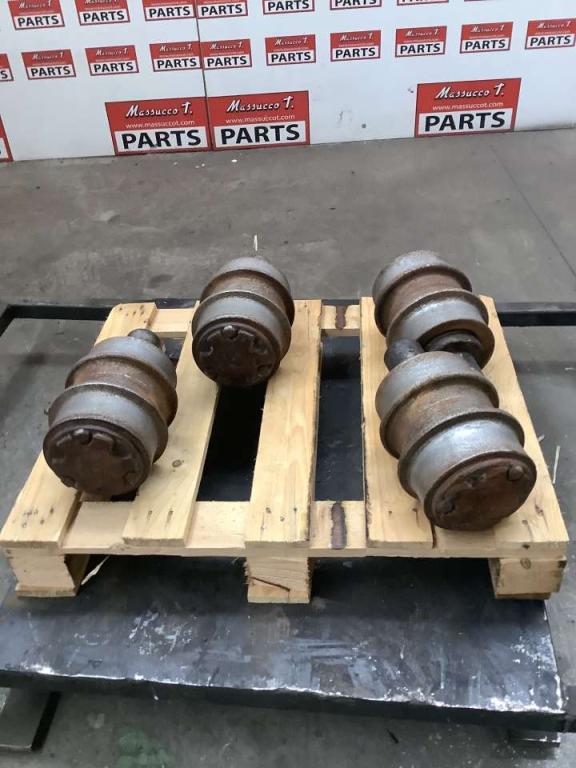 Carrier rollers for New Holland E 385 Photo 1