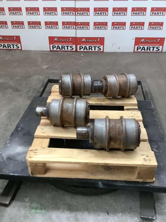 Carrier rollers for New Holland E 385 Photo 2