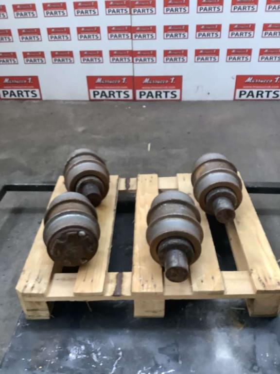 Carrier rollers for New Holland E 385 Photo 3