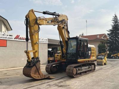 Caterpillar 318FL sold by Massucco T. Srl