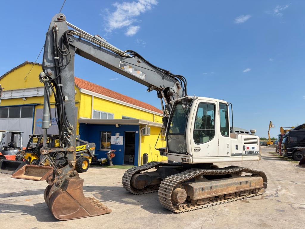 Liebherr R 900 C Litronic Photo 1