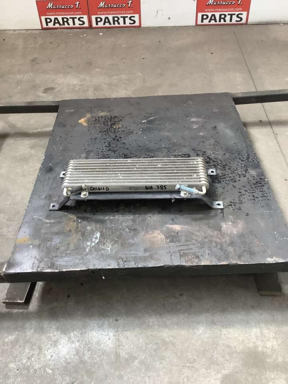 Diesel fuel cooler for New Holland E 385 Photo 1