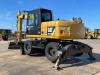 Caterpillar M313D VA - Outriggers + Blade Photo 3 thumbnail
