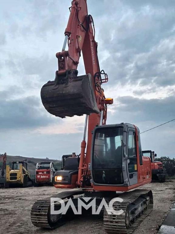 Hitachi ZX130 Photo 4