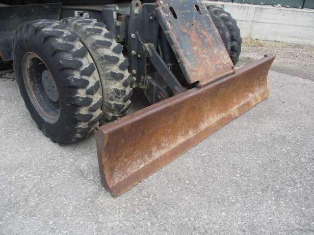 Komatsu PW140-7 Photo 10