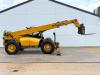 Caterpillar TH460B - 15m Reach / 4 Wheel Steering Photo 6 thumbnail
