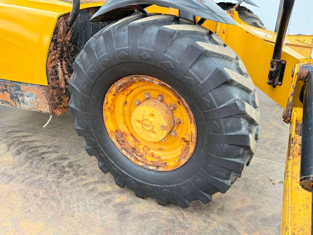 Caterpillar TH460B - 15m Reach / 4 Wheel Steering Photo 27