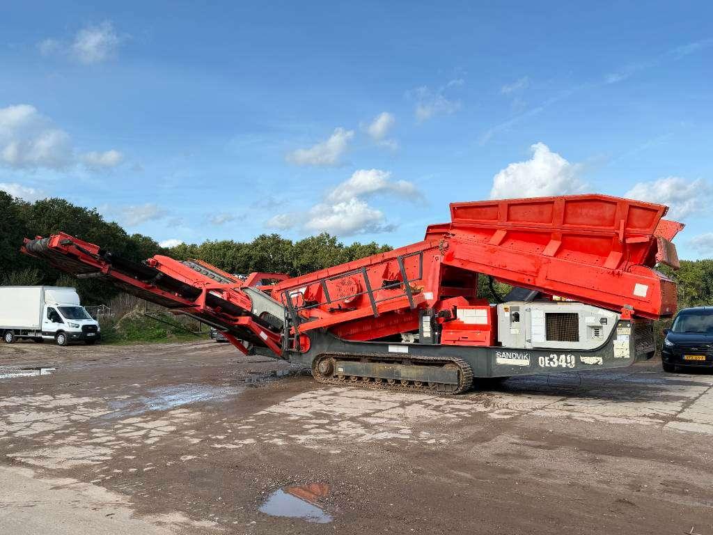 Sandvik QE340 - Caterpillar Engine / 2 Side Convey Photo 1
