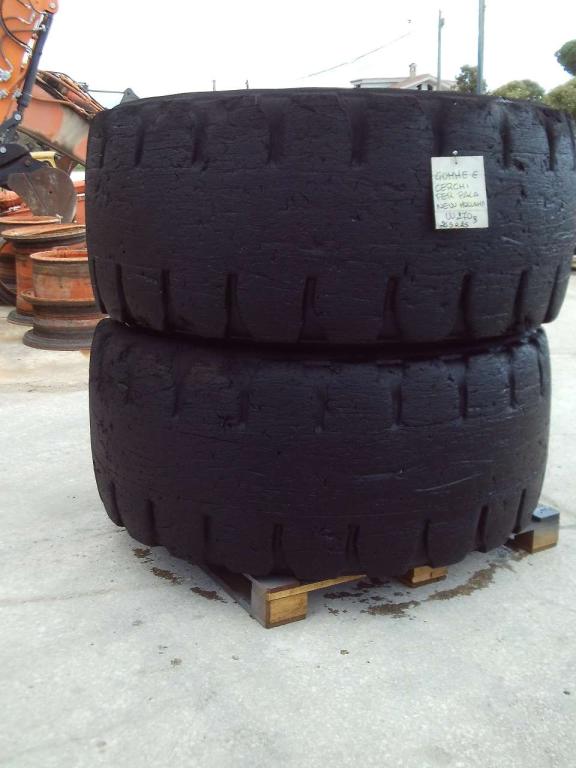 Tire with rim for New Holland W270B  - 26.5R25 Photo 1
