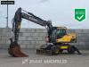 Volvo EW210 D Outrigers + Blade Photo 1 thumbnail